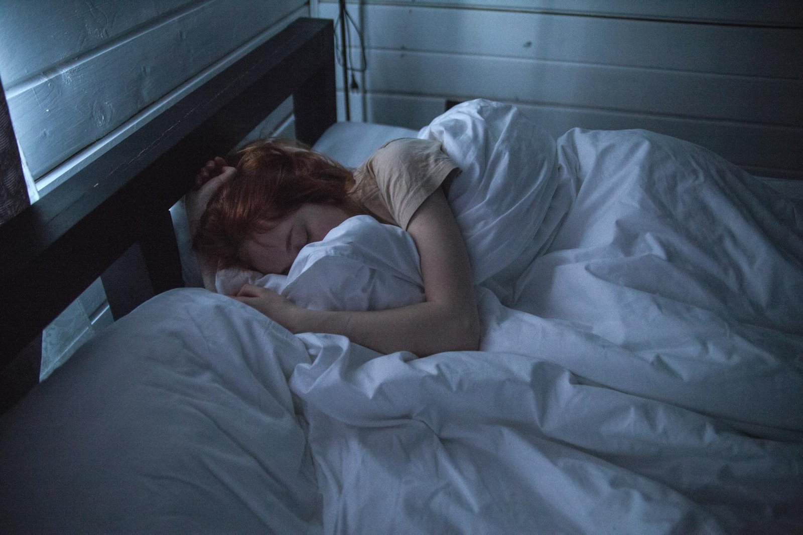 A quiet bedroom prepared for sleep